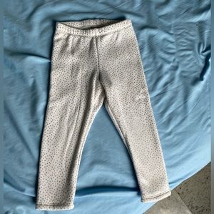 White sweat pants with gold spots